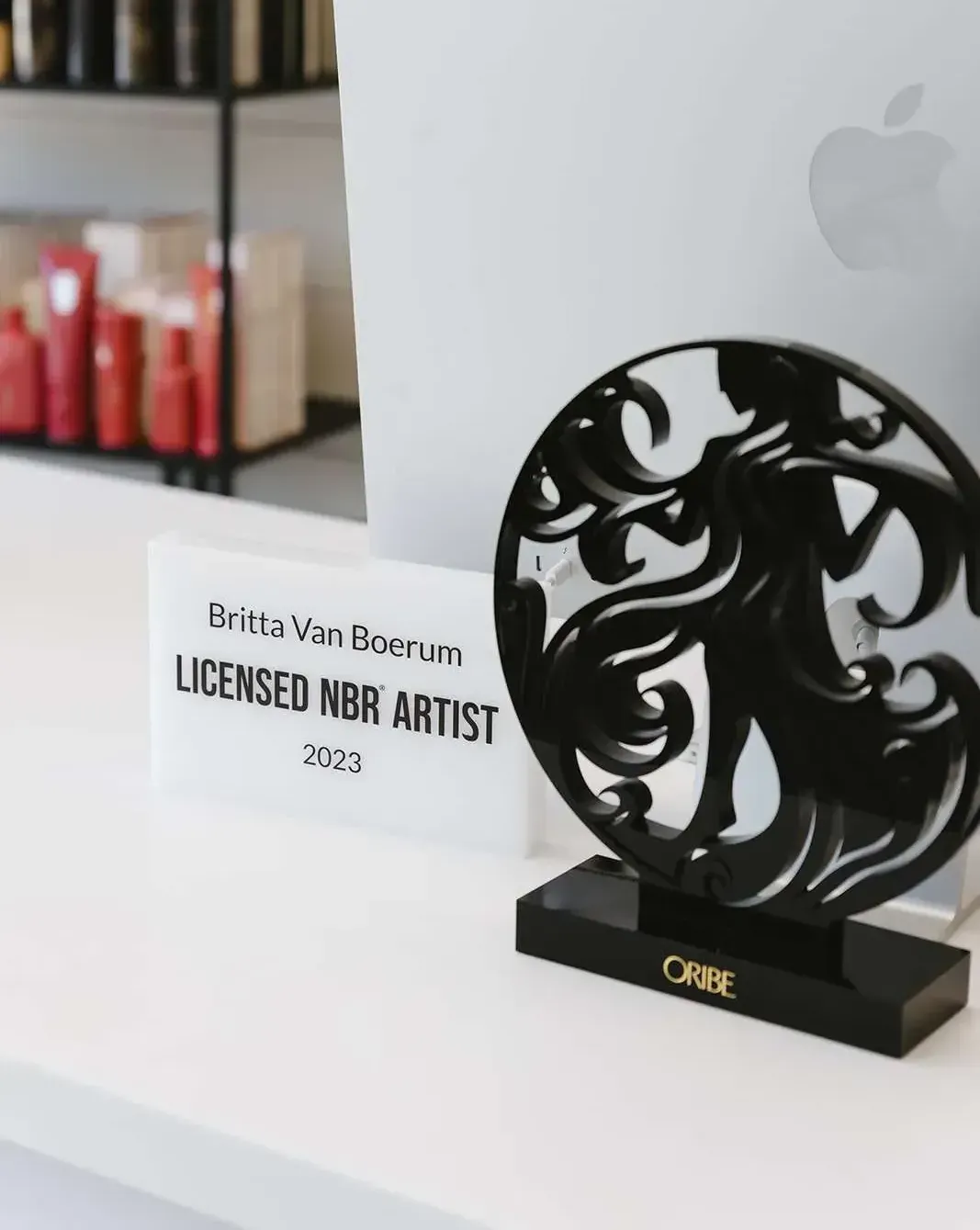 A licensed nbr artist sign next to a statue